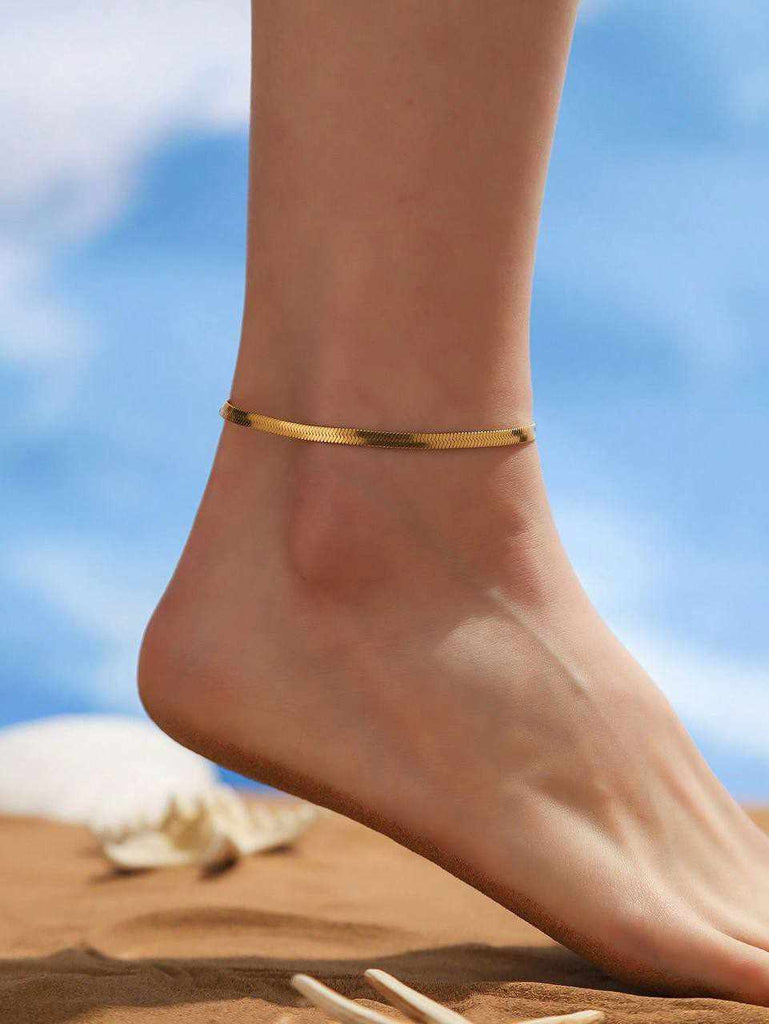 Women's anklet on the back of the snake