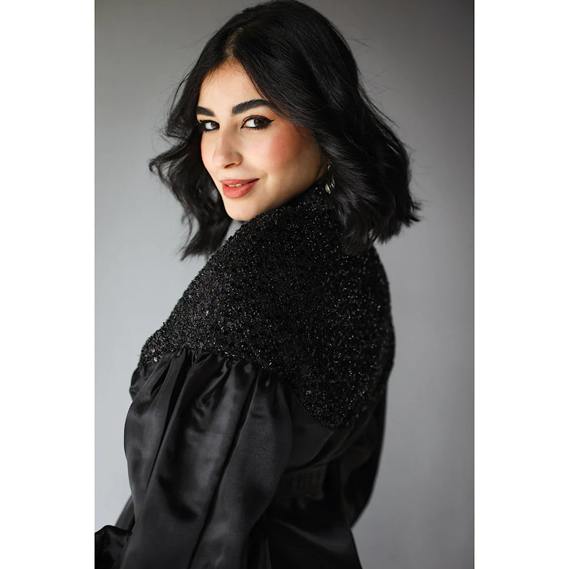 Voluminous embroidered dress