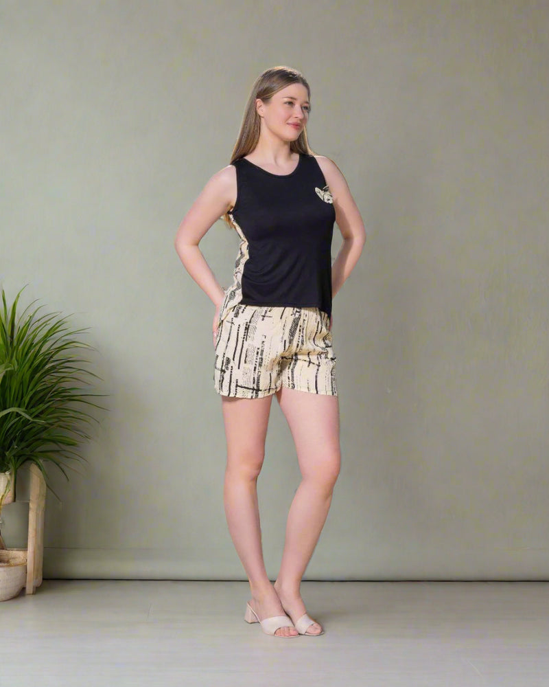 Elegant two-piece pajama set, shorts + summer top, made of high-quality materials.
