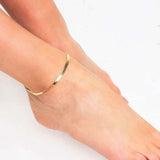 Women's anklet on the back of the snake