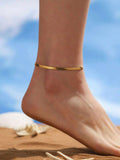 Women's anklet on the back of the snake