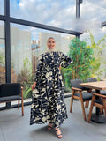 Women's winter abaya with a wide floral print